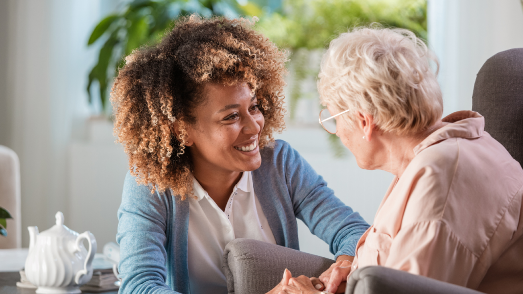 a woman caring for older woman